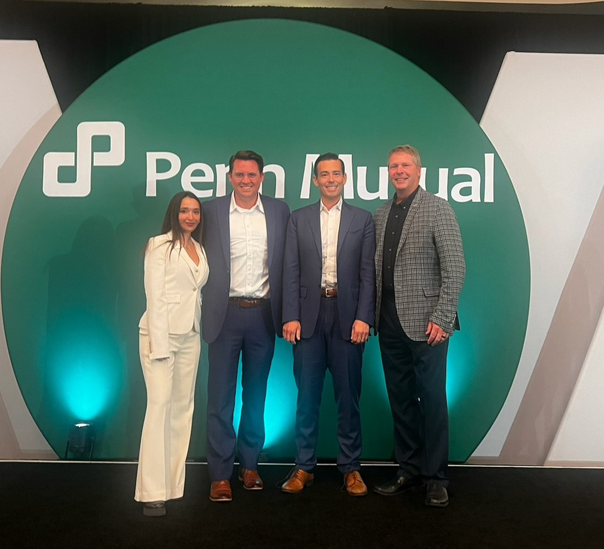 Maria Olmos, Jake, Alex Jones and Mike Claudio of Guardian Tax Consultants at the Penn Mutual Life Sales Summit.