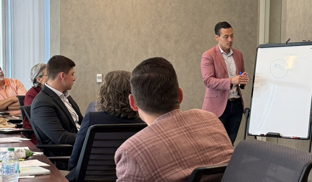 Alex Jones of Guardian Tax Consultants presenting MSO structure on a whiteboard to commercial, credit, treasury, and wealth teams at Bank of Oklahoma in Oklahoma City.
