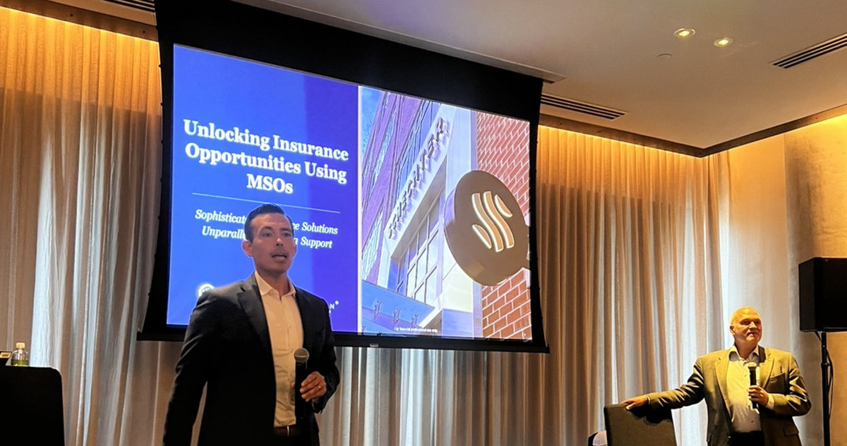 Alex Jones of Guardian Tax Consultants presenting Unlocking Insurance Opportunities Using MSOs at the Penn Mutual Life Sales Summit, with co-presenter Jordan Smith.